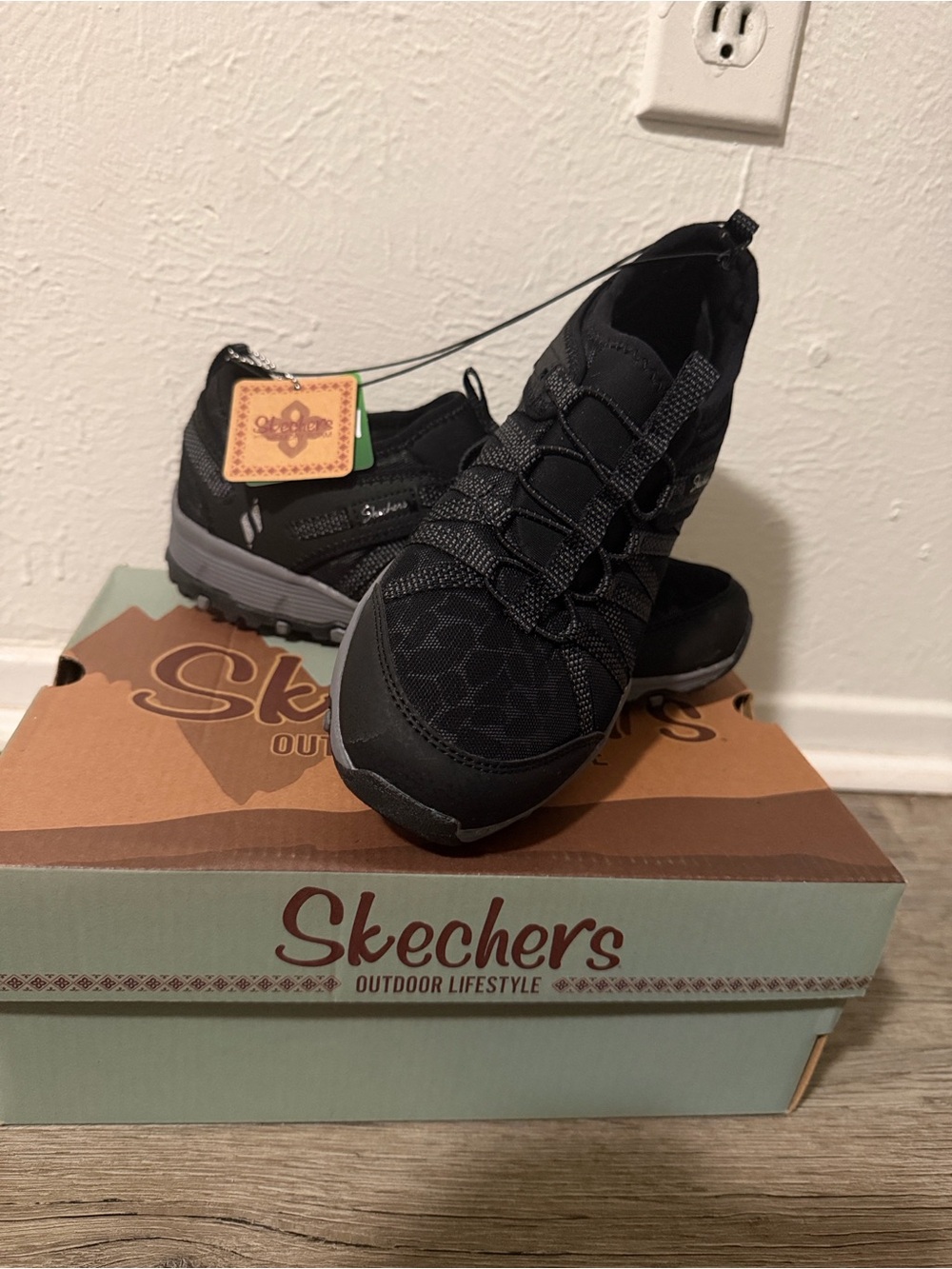Skechers women’s Black Slip-On Athletic Sneakers